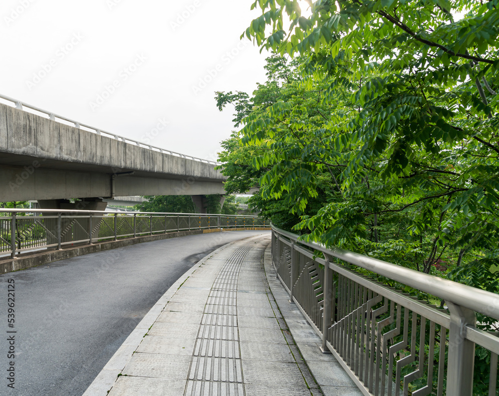 Fototapeta premium Highway and viaduct under the blue clouds