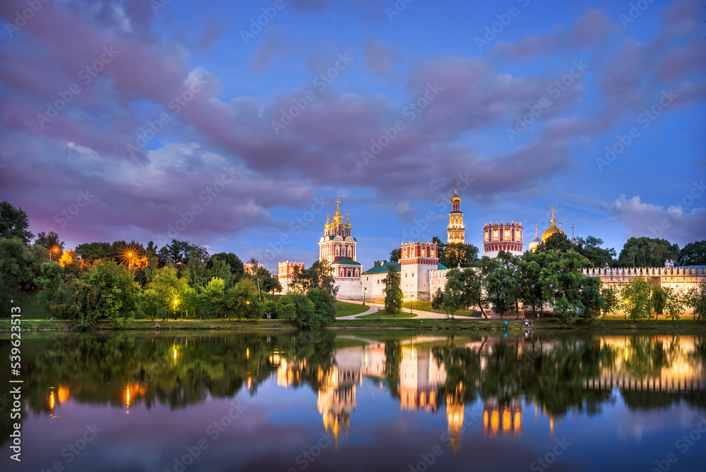 Temples and towers of the Novodevichy Convent and reflection, Moscow