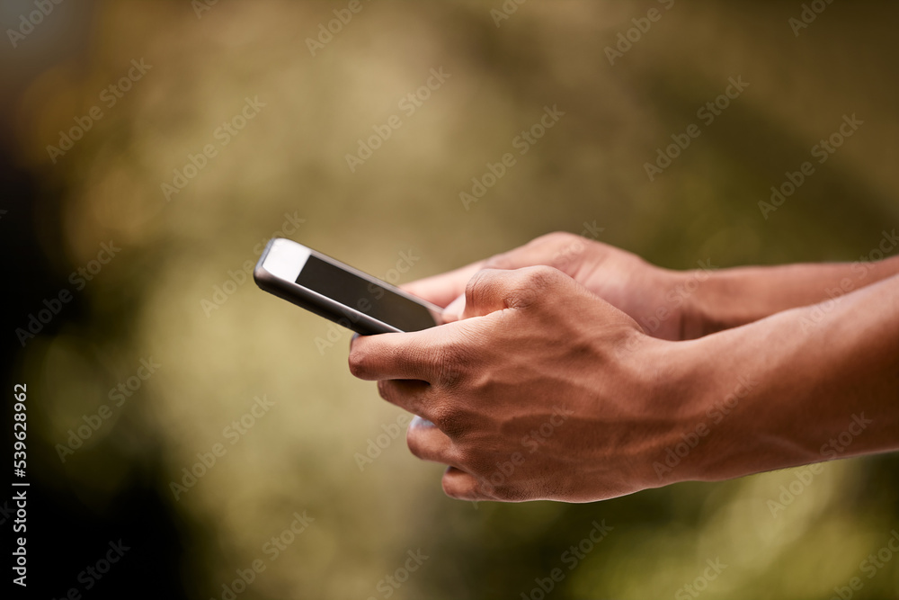 Man hands, park and typing phone on mobile app, social media and digital iot connection outdoors. Closeup smartphone internet website, social network communication and 5g cellphone technology online Man hands, park and typing phone on mobile app, social media and digital iot connection outdoors. Closeup smartphone internet website, social network communication and 5g cellphone technology online