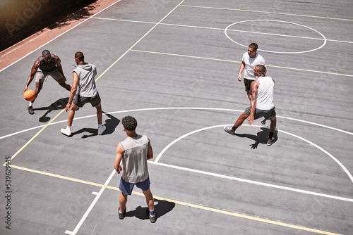 Basketball court, fitness men or competition game in workout, training or exercise in New York for health, wellness or fitness. Men, basketball player or energy sports people or friends in team match