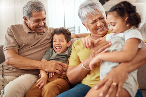 Tablou pe pânză Love, happy family and grandparents with funny kids at home for babysitting, care and bonding in retirement