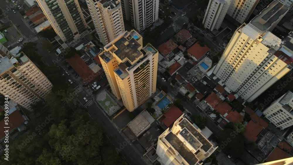 Panning top down drone shot of sky scrapers in Sao Paulo, Brazil, flying over sky scraper