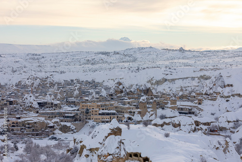Fototapeta Naklejka Na Ścianę i Meble -  Pigeon Valley and Cave town in Goreme during winter time. Cappadocia, Turkey. 