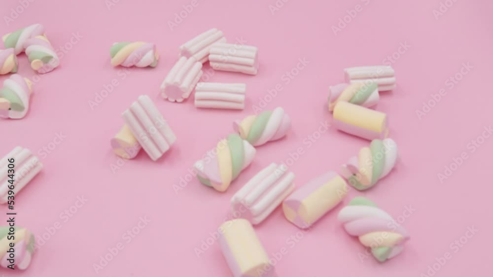 Colorful Marshmallows on Pink Background Colorful Marshmallows on Pink Background