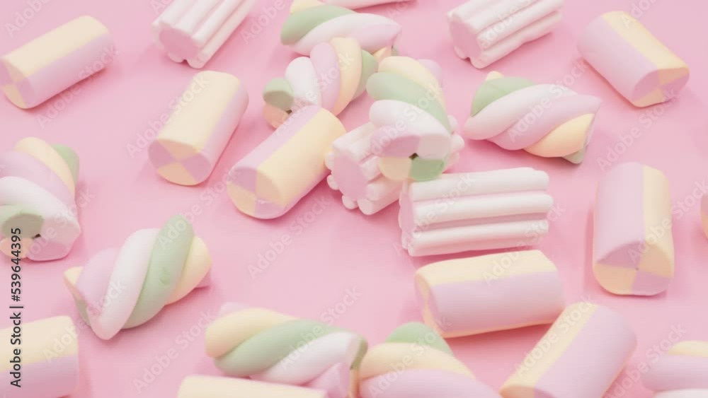 Colorful Marshmallows on Pink Background