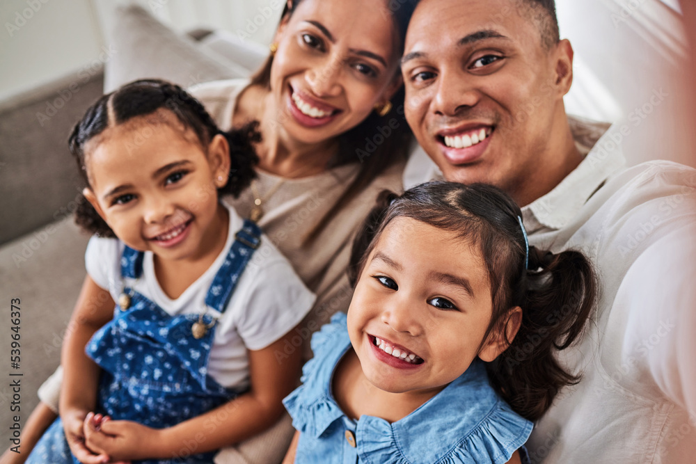 Smile, selfie and portrait of a happy family that love enjoy quality time, relaxing and bonding together in a house. Mother, father and girl children siblings smiling for pictures at home in Lisbon Smile, selfie and portrait of a happy family that love enjoy quality time, relaxing and bonding together in a house. Mother, father and girl children siblings smiling for pictures at home in Lisbon