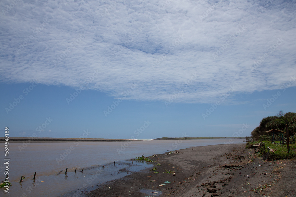 A beautiful shoreline under the blue sky A beautiful shoreline under the blue sky
