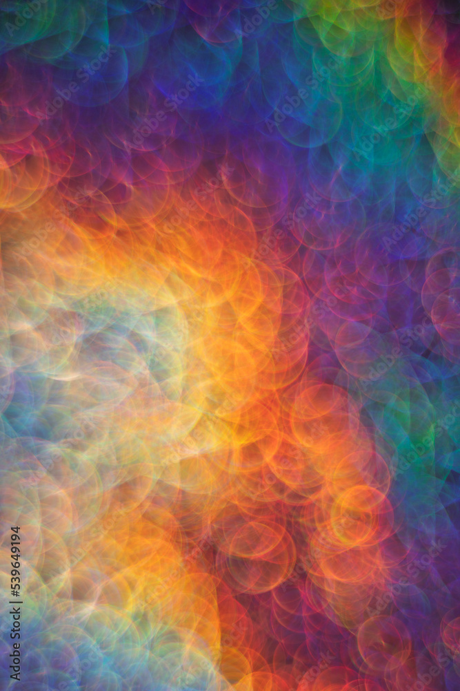 bright abstract iridescent background with bokeh holography