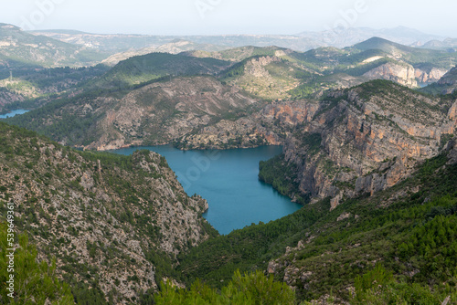 Beautiful landscape photo with the mountains surrounding the reservoir of cortes del pallas, Valencian community, Spain