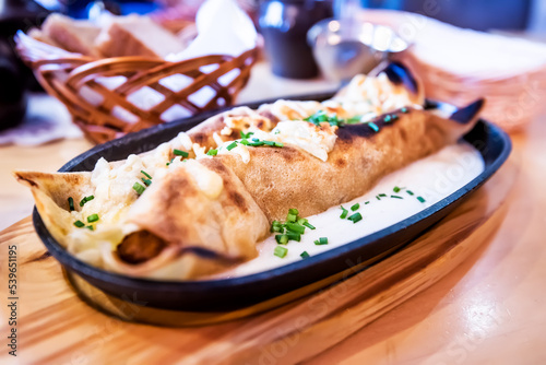 Polish traditional crepes with stewed pork.