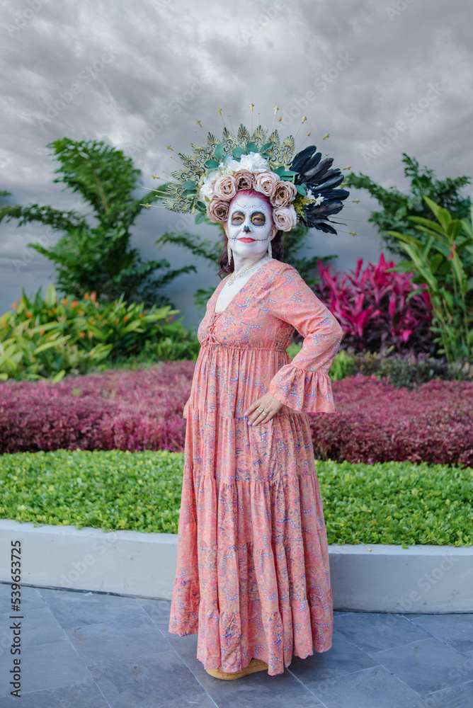 Portrait of Mexican woman made up as a catrina. Portrait of Mexican woman made up as a catrina.