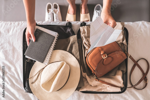 Travel. Staycation.local travel new normal.Girl traveler packing luggage in suitcase Travel,tourism,vacation,relocation.Mental health and travel vacation Film grain photo