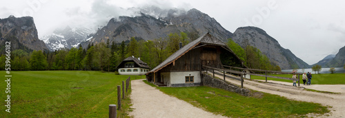 Konigsee lake with st Bartholomew church surrounded by mountains, Berchtesgaden National Park, Bavaria, Germany photo