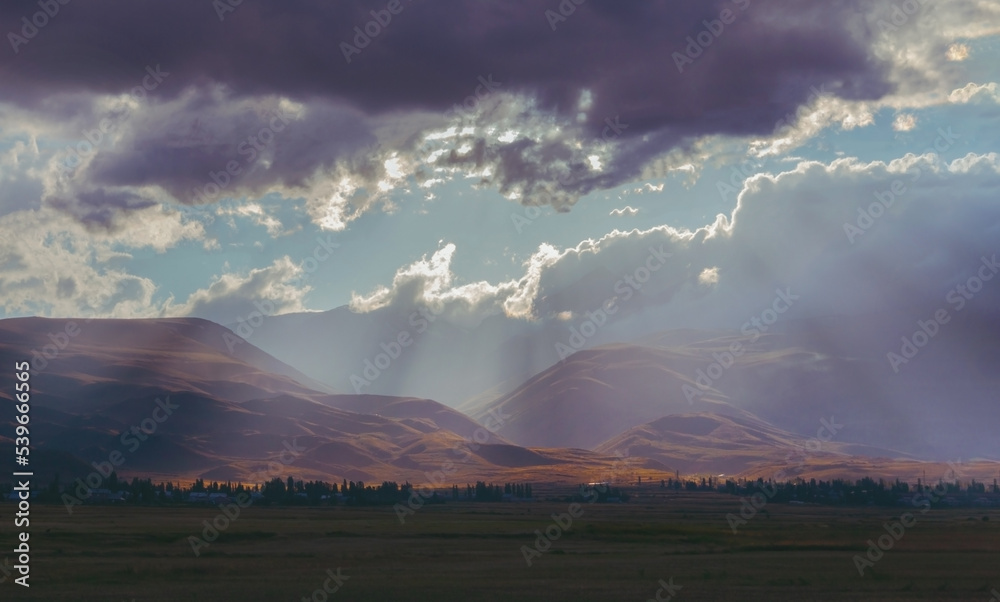 beautiful view of village with rocks and mountains
valley view on sunset
beautiful sunset light with clouds over the mountains