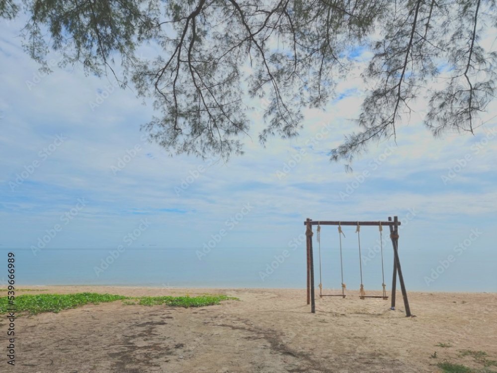 Romantic swings in Samila beach Thailand watching in the morning Romantic swings in Samila beach Thailand watching in the morning