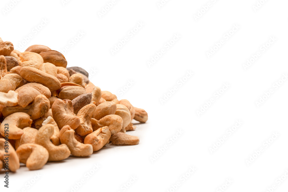 A group of almonds, pistachios, walnuts, macadamia, cashews. A group of almonds, pistachios, walnuts, macadamia, cashews.