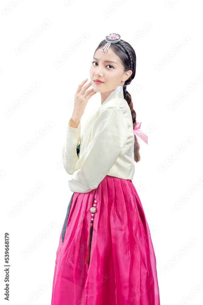 Asian woman wearing a traditional Korean national costume, Hanbok, standing Asian woman wearing a traditional Korean national costume, Hanbok, standing
