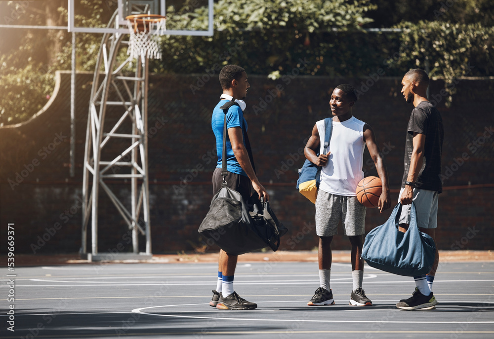 Obraz premium Basketball, sport and men planning game, training and exercise on a court together. Happy, smile and African friends and team talking before fitness, sports or cardio workout for competition
