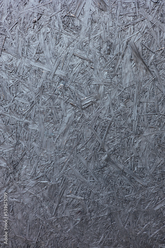 Pressed wood painted gray