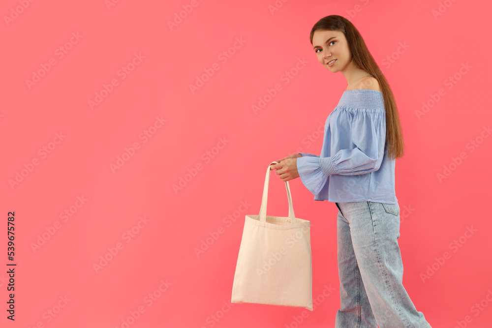 Concept of people, young woman on pink background Concept of people, young woman on pink background