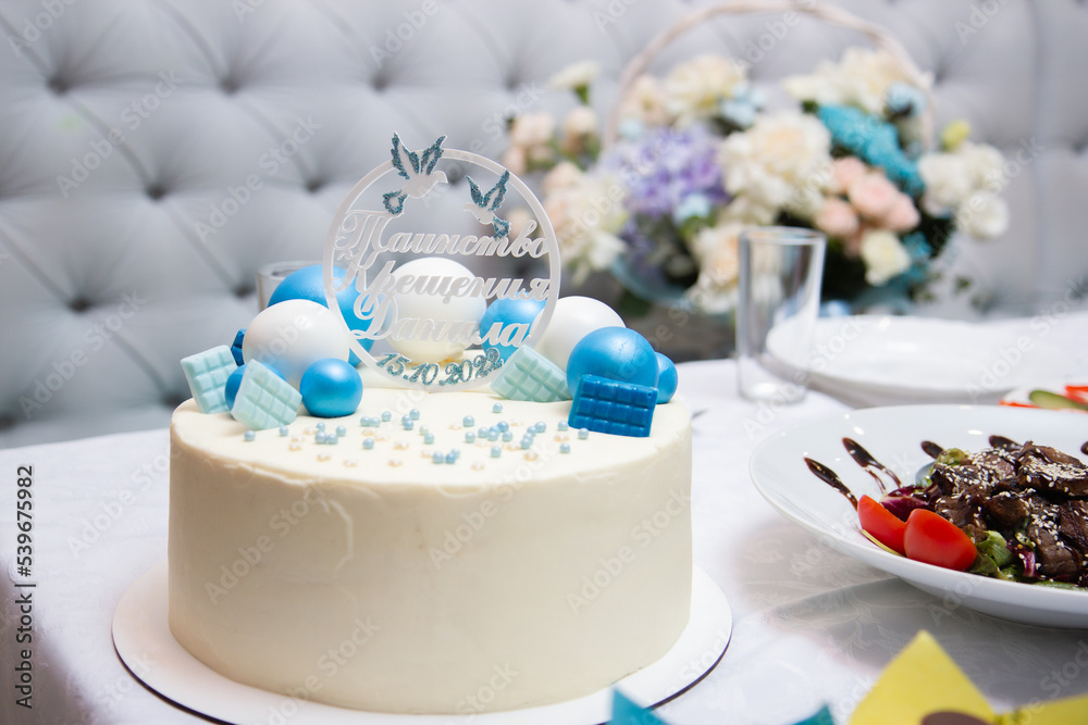 white cake with blue decor, the inscription on the cake white cake with blue decor, the inscription on the cake