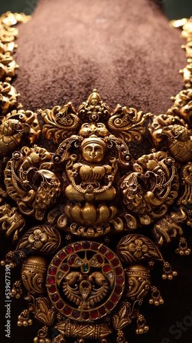 Bangalore, India 4th May 2022: Indian customer in a jewellery exhibition buying gold on the occasion of Dhanteras and Vijayalaxmi. Traditional ornaments with marvelous stones and intricate designs.