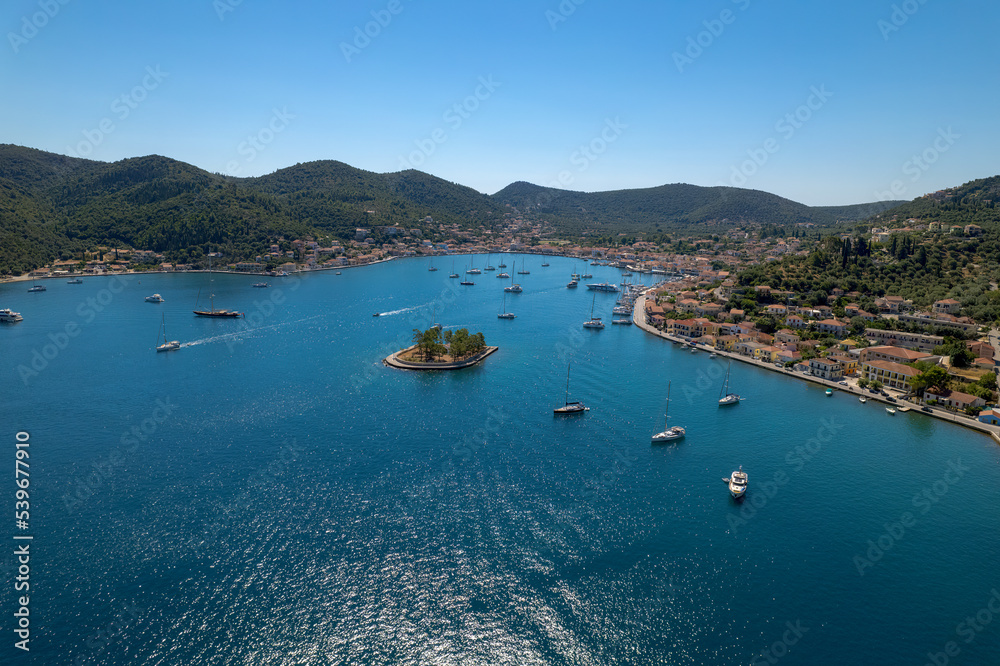 Aerial view of a sailboats moored in the picturesque port of Vathy village, the capital of Ithaca island, Ionian, Greece.