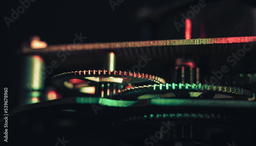 Close up Beautiful old gearsin neon light. Minimalism retro style concept.  Background pattern for design. Macro photography view. photo