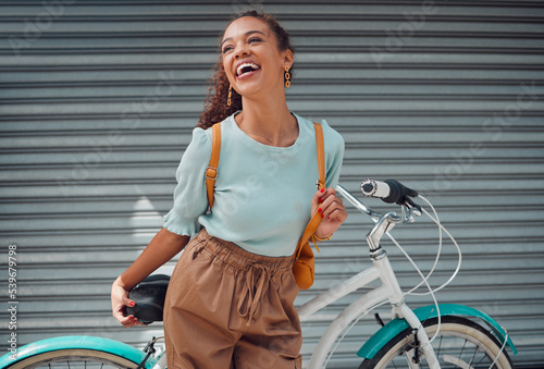 Bicycle, travel and black woman student excited for outdoor lifestyle, eco friendly cycling transport on garage door background. Gen z girl with bike and backpack on her way to college or university
