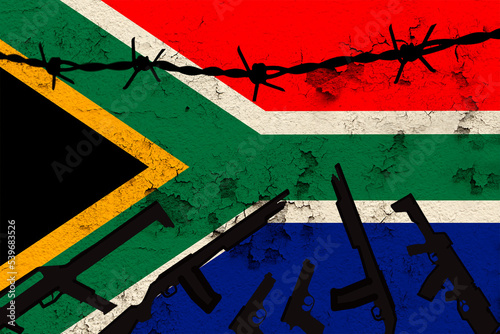national flag of South Africa on textured background, rows of barbed wire, concept of war, revolution, armed uprising in country, increase in crime in state, terrorist attack, redistribution of power