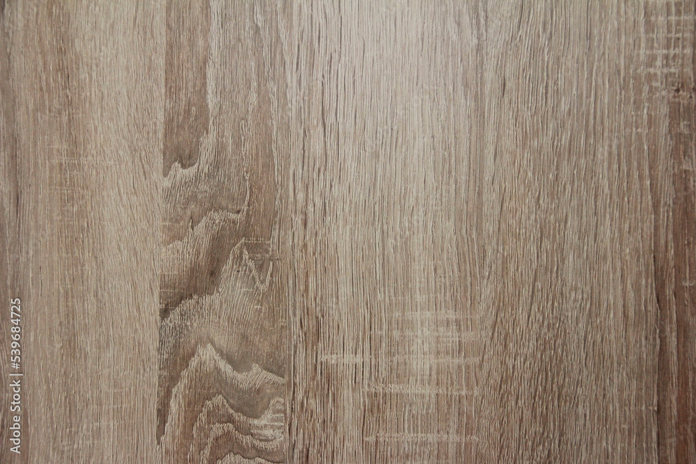 texture of brown wood with dark and light stripes and veins