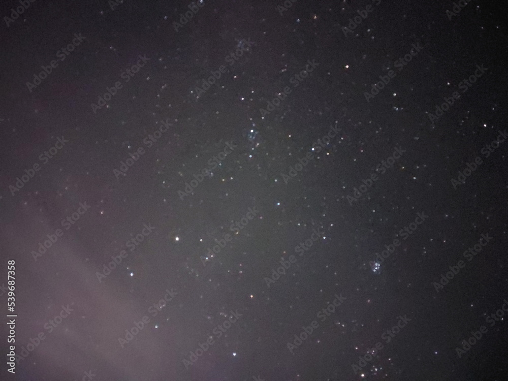 Fototapeta premium Bright night starry sky in the village