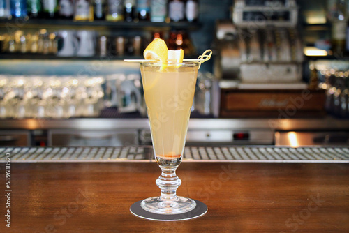 Death in the Afternoon Cocktail on bar counter.