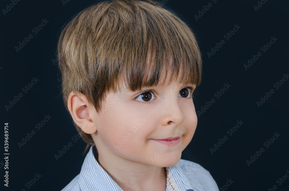 Portrait of a little boy turning his head to the side Portrait of a little boy turning his head to the side
