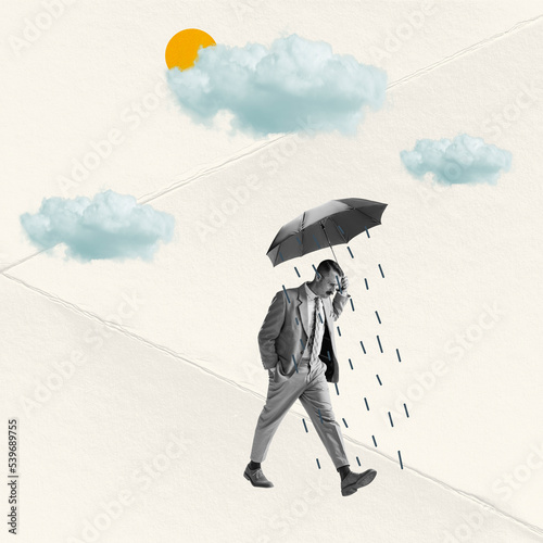 Sad man walking under umbrella on abstract background with drawings. Bright contemporary collage. Art, fashion and emptions, feelings. Ideas, vintage, retro style, imagination photo
