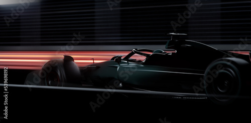 Modern generic sports racing car driving fast on a track with bright lights. Realistic 3d rendering