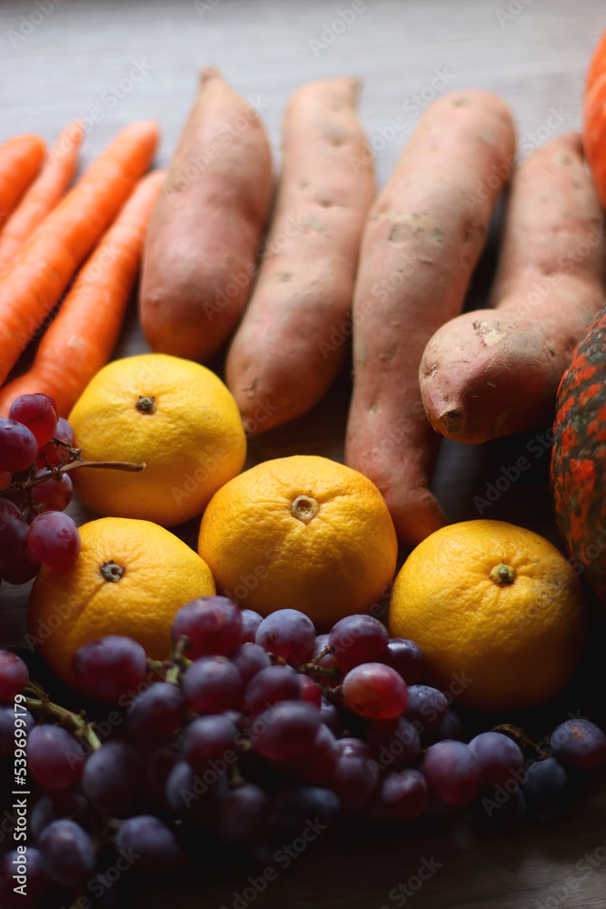 Various healthy autumnal food on wooden table. Selective focus. Various healthy autumnal food on wooden table. Selective focus.