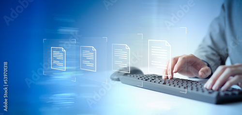 Document Management System DMS Online Database and automated processes to manage files in an organization effectively with ERP, enterprise business technology. businessman using virtual screen.