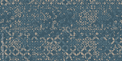 African Ikat paisley embroidery on navy blue background.geometric ethnic oriental seamless pattern traditional.Aztec style abstract vector illustration.design for texture,fabric,clothing,wrapping.