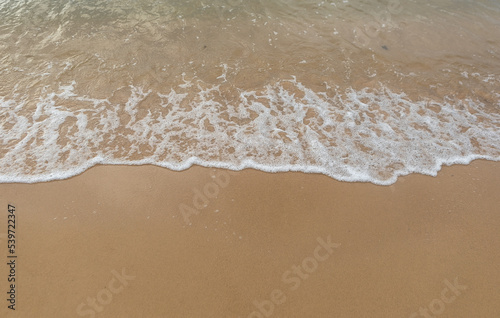 Beautiful beach with the smooth foam of sea in the morning of Rayong province Thailand