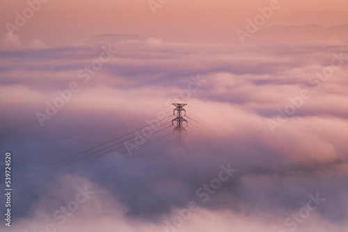 A pylon under the morning fog
