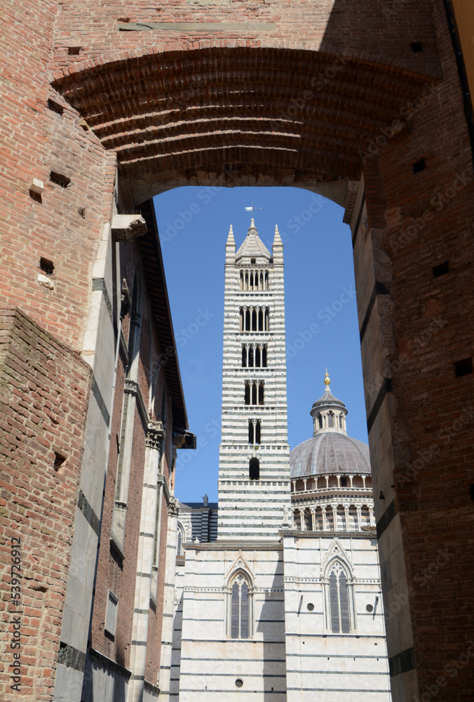 The cathedral of Siena Santa Maria Assunta is built in the Italian Romanesque-Gothic style and is one of the most beautiful churches built in this style in Italy