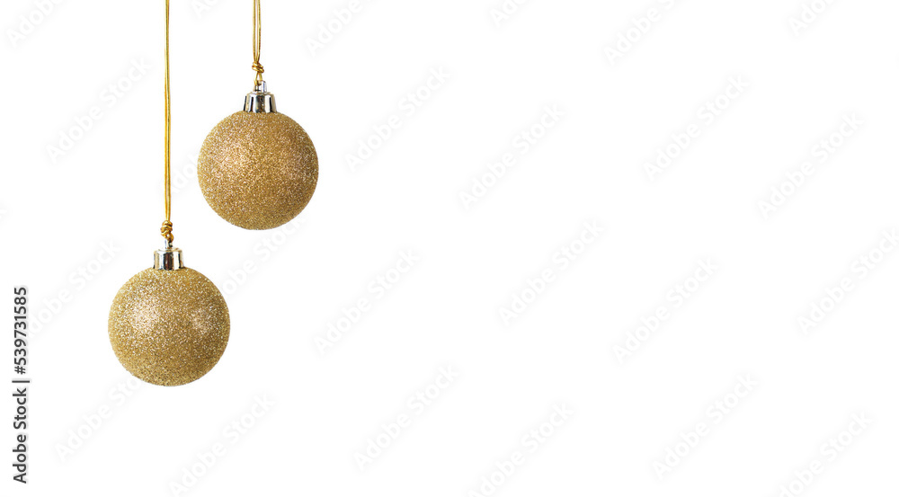 two golden Christmas balls with glitter hanging in front of a white background