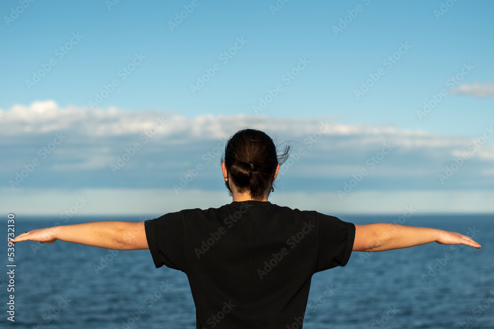 man looks at the ocean man looks at the ocean