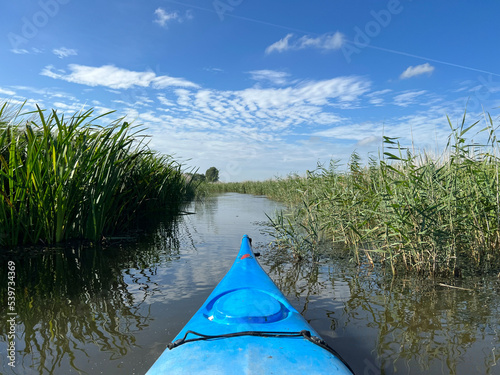 Canoeing through canal around Lollum