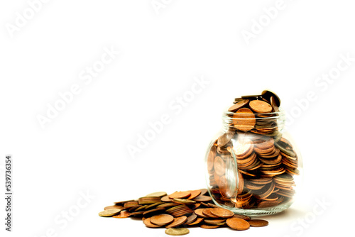 Many coins in bottle and a pile on ground white background, Money growing concept and sustainable investment, Business success and financial concept, Banking and economy idea 