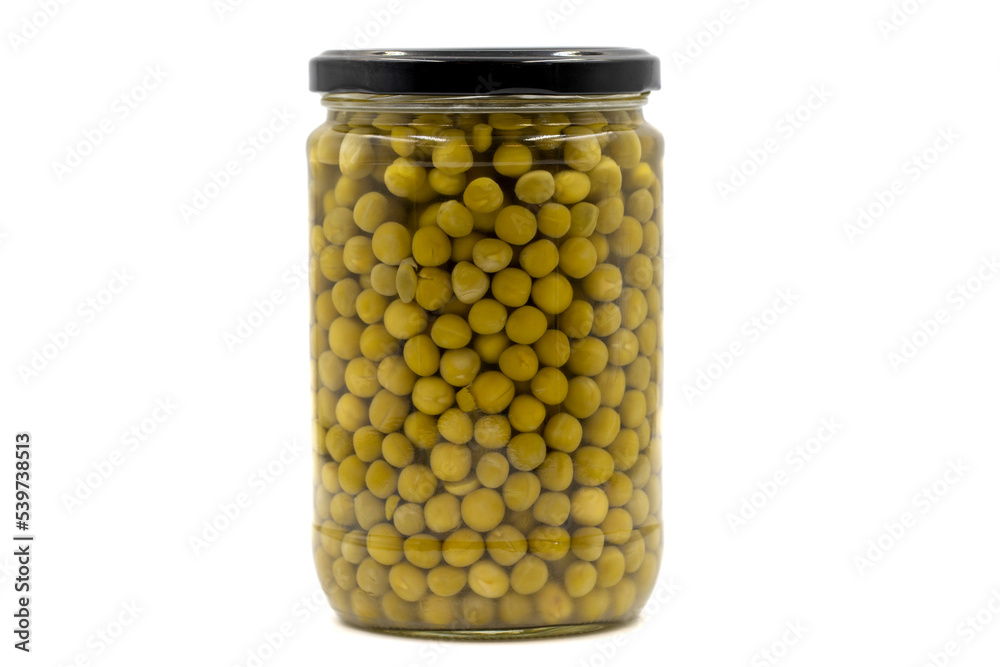 Canned peas in glass jar isolated on white background