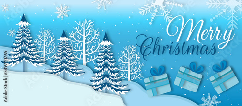 christmast lettering for greetings card background with snow and tree photo