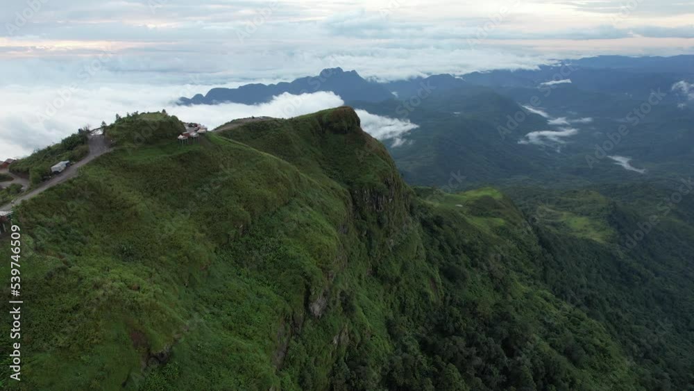 Aerial landscape view of mountain road, the sea of fog and tourist resort in Phu Thap Boek, Thailand by drone Aerial landscape view of mountain road, the sea of fog and tourist resort in Phu Thap Boek, Thailand by drone