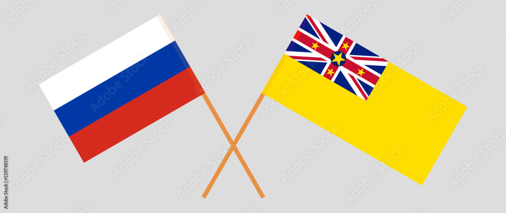 Crossed flags of Russia and Niue. Official colors. Correct proportion